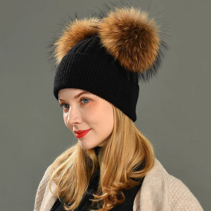 A woman wearing a black fur hat designed by MVFURS