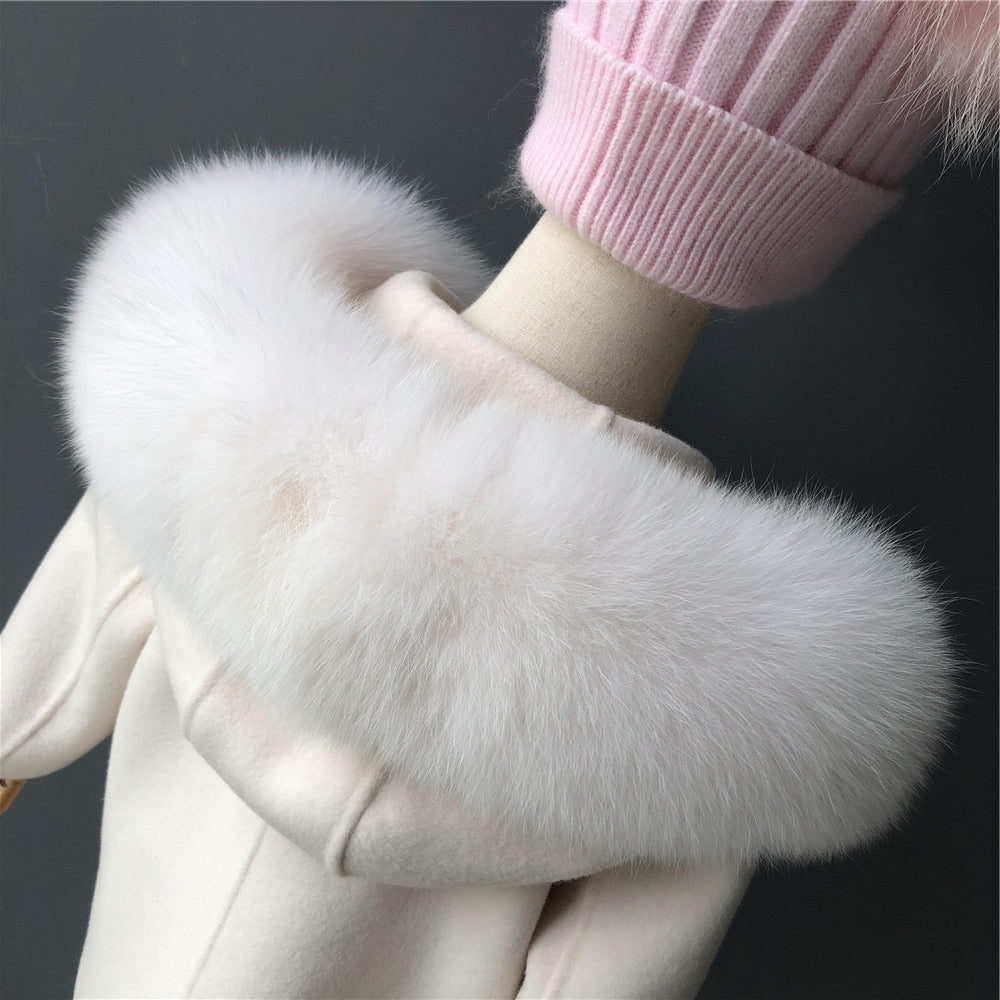 A nude cashmere and fur kid coat designed by MVFURS.
