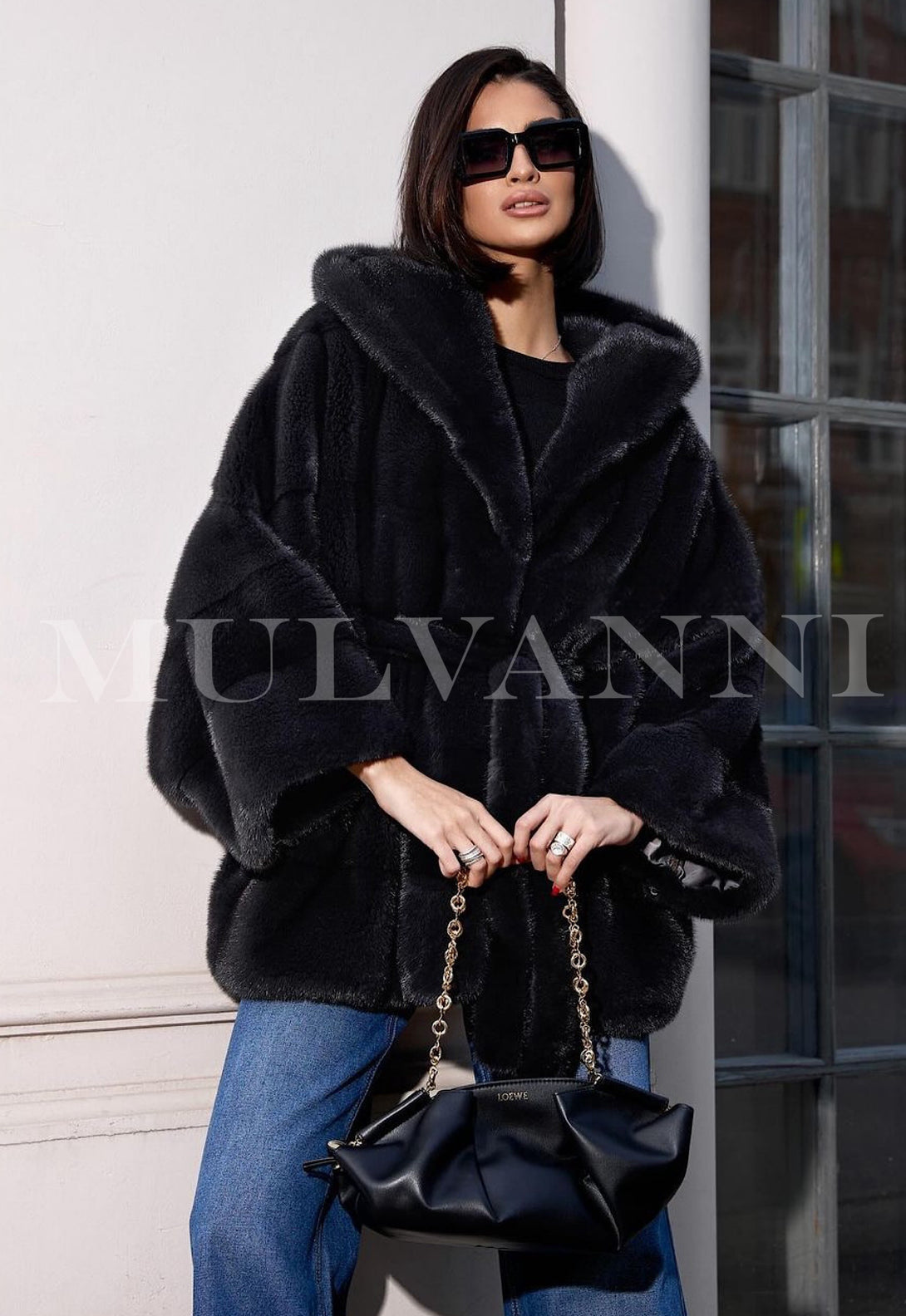 ALEXANDRA Hooded Mink black Coat for woman stylish designer fur coat luxurious winter outerwear model wearing sunglasses