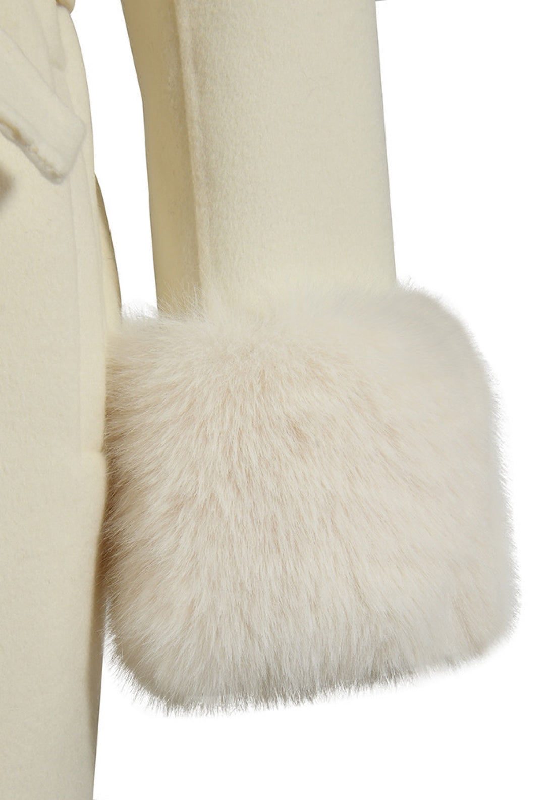 Detail of a white faux fur cuff from our luxurious cashmere coat for women. 