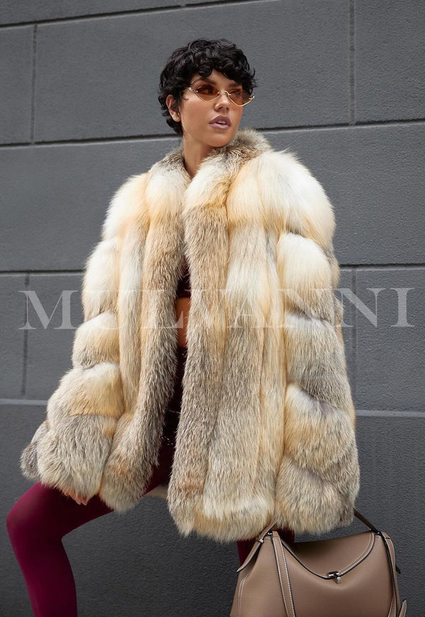 High quality Saga Furs genuine gold fox fur coat for women with luxurious, plush material and classic draped silhouette for elegant warmth.