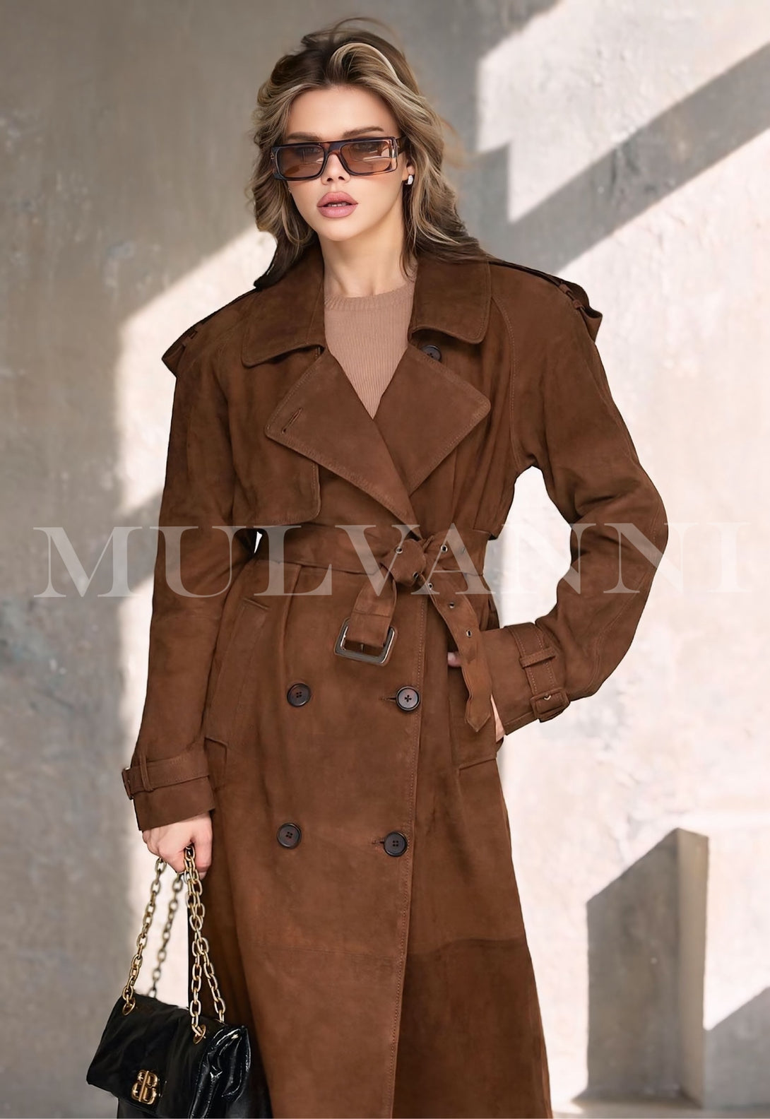 Woman wearing HATTI Suede Leather Trench Coat for winter, showing trendy double-breasted design and tailored fit.