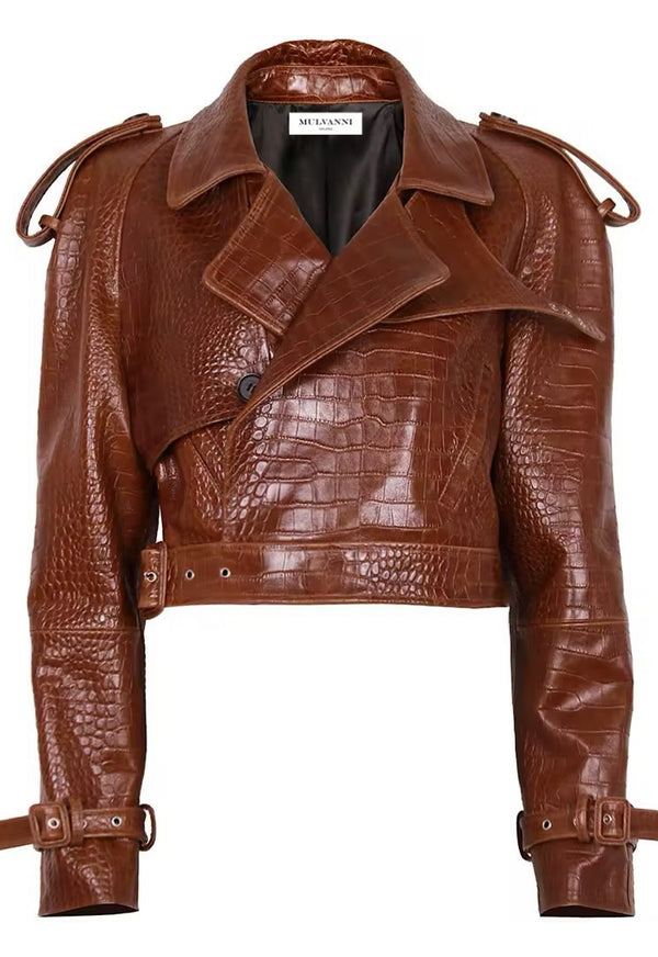 A trendy cropped embossed leather jacket for women, featuring a textured surface and a fitted silhouette. The jacket has a front closure, stylish side pockets, and a modern design that adds a unique edge to any outfit.