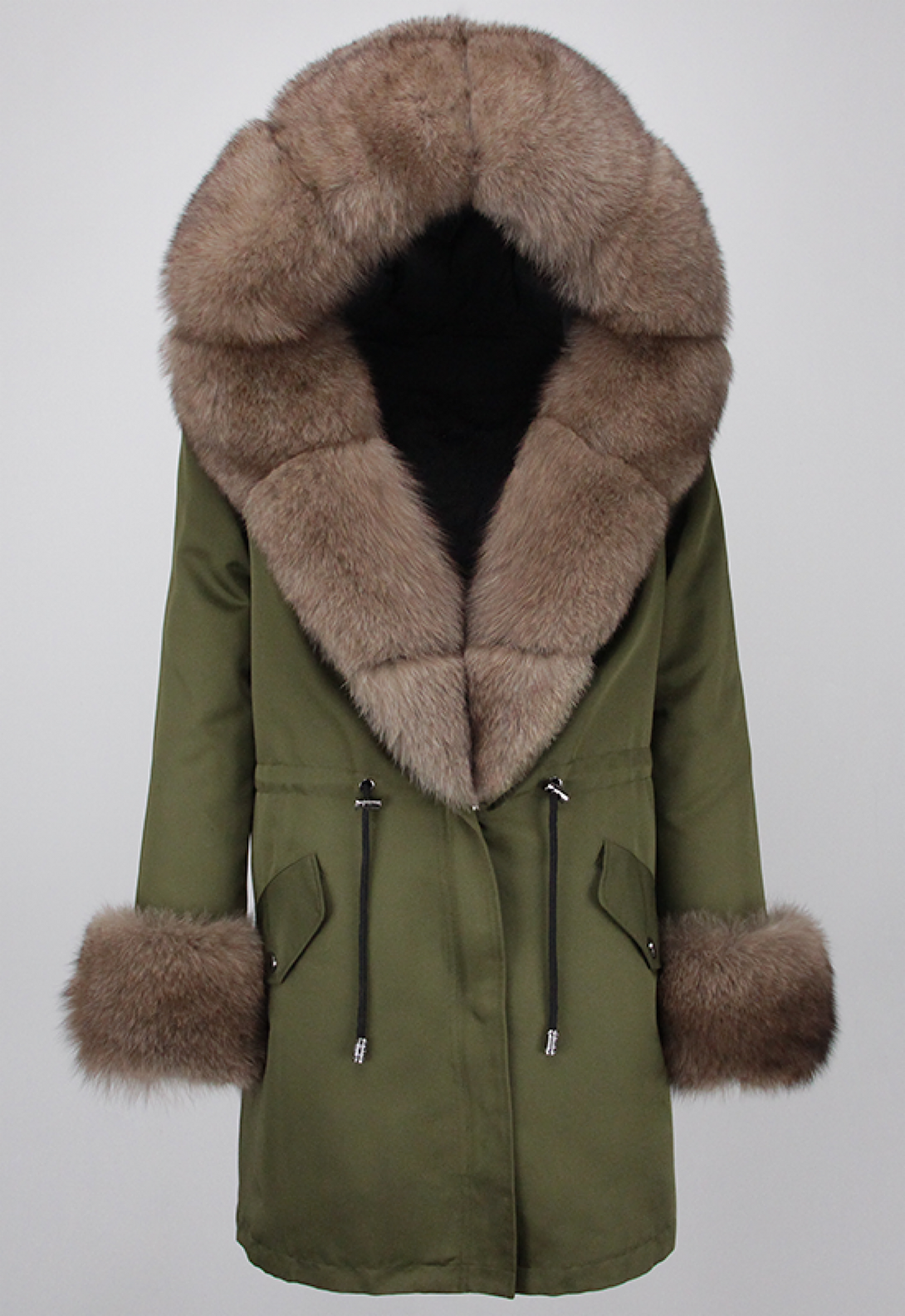 A stylish green hooded parka with luxurious brown fox fur trim and cuffs. The parka's elegant design balances warmth and practicality, making it an ideal choice for winter outings.