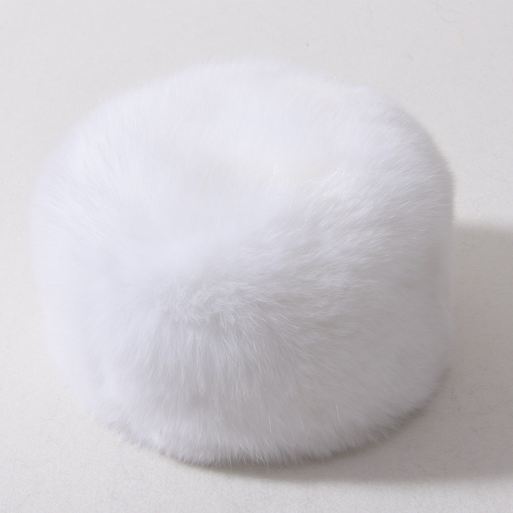 White fox fur hat for woman showcasing high quality.