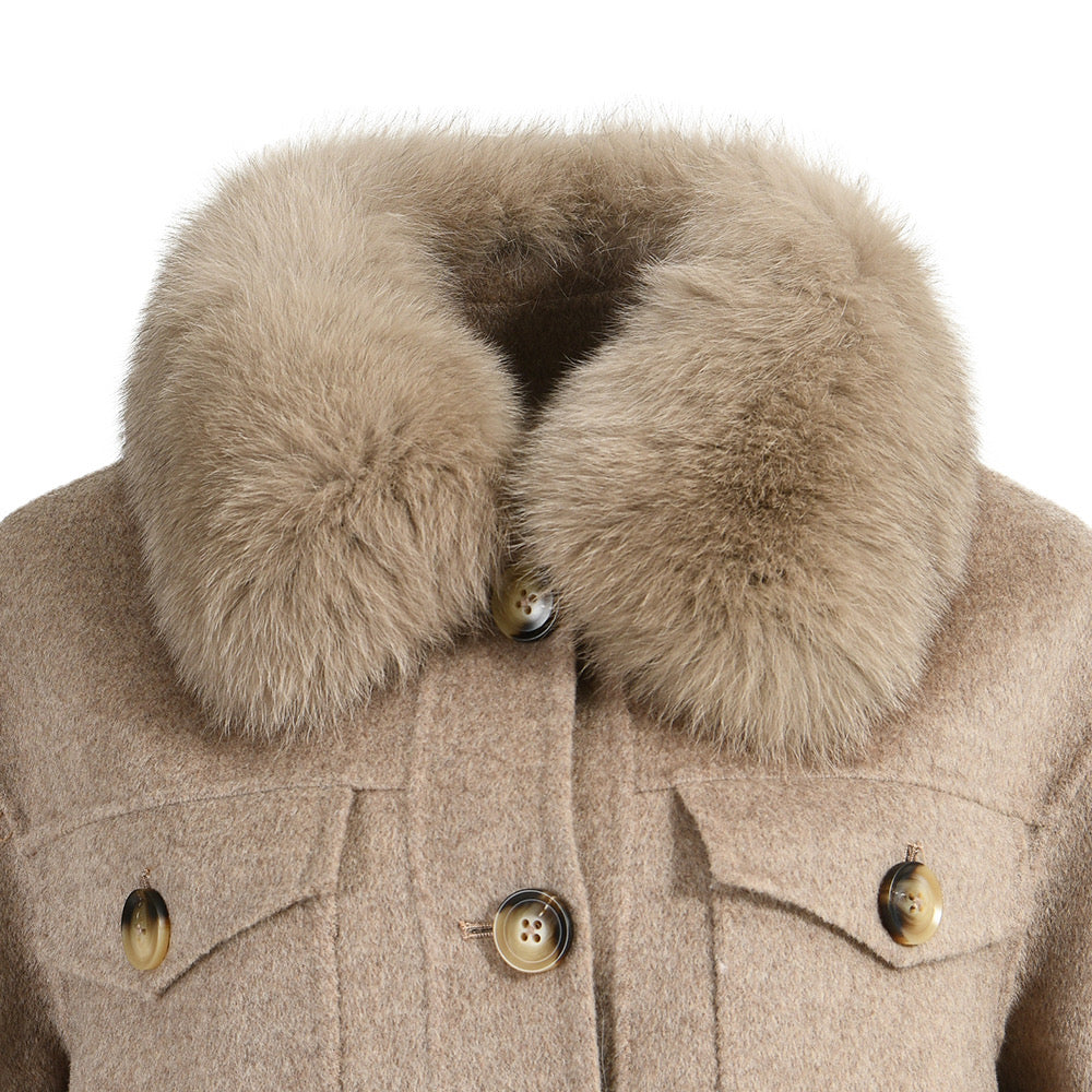 Close up of a cashmere coat for woman showcasing the high quality fox fur. 