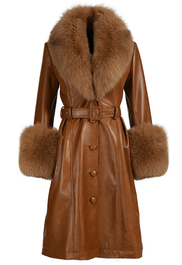 Sophisticated ADARA brown leather trench coat for women, featuring luxurious fox fur detailing, combining designer elegance with timeless style.