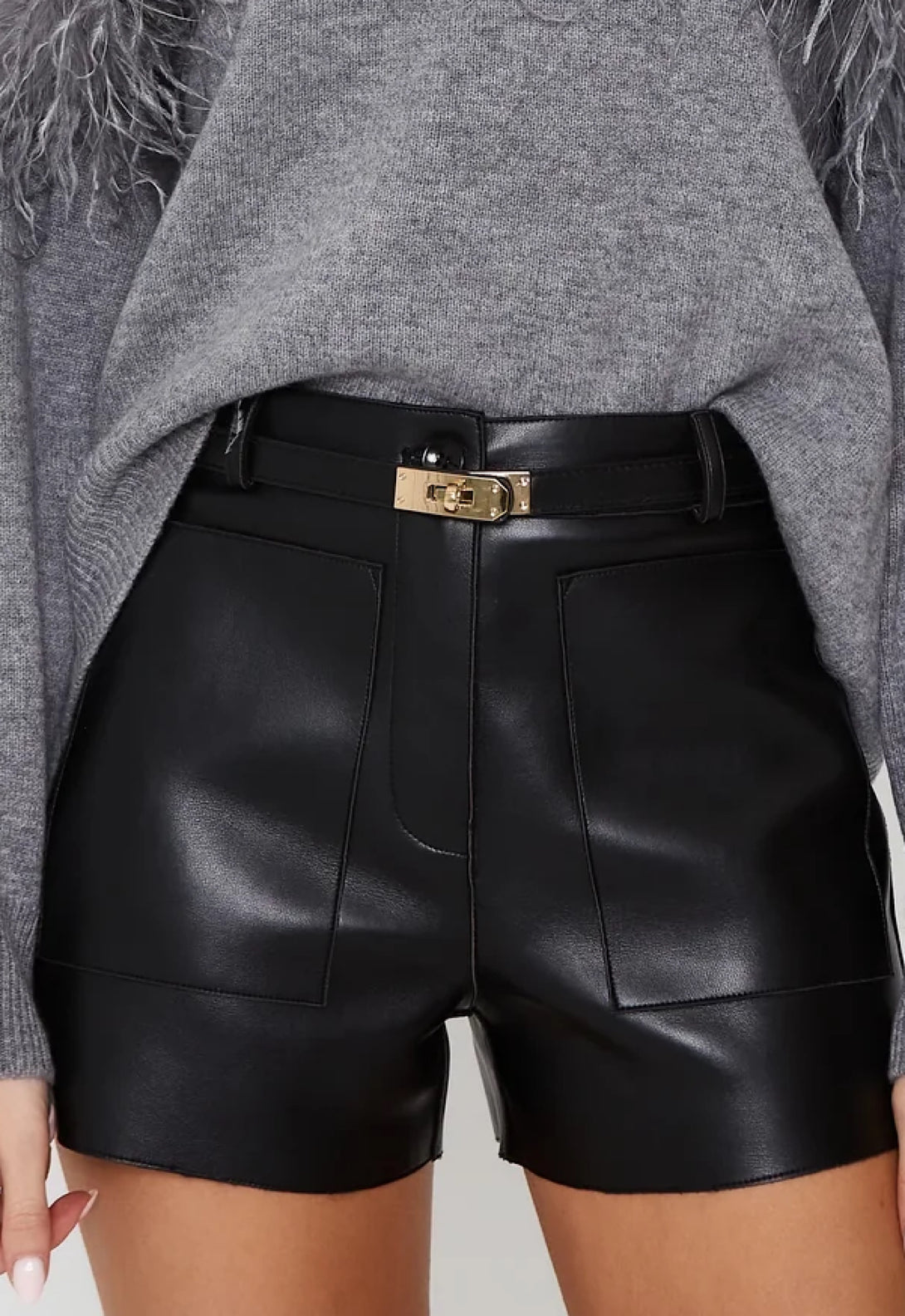 Designer luxury Hermes black leather shorts with gold buckle, perfect fit and high-quality craftsmanship, ideal for stylish fall and winter outfits