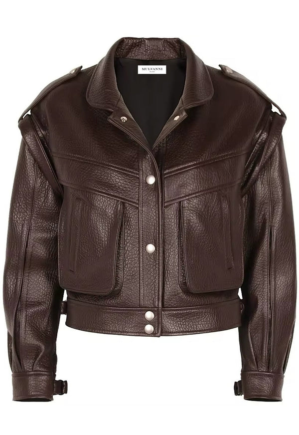 A fashionable brown leather jacket made from high-quality leather, designed to be chic and stylish for fall. The jacket features a modern cut and elegant details, making it a versatile addition to her autumn wardrobe.