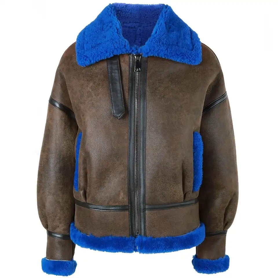 A stylish brown and blue shearling leather jacket for men, featuring a unique color combination that adds a modern twist to classic outerwear.