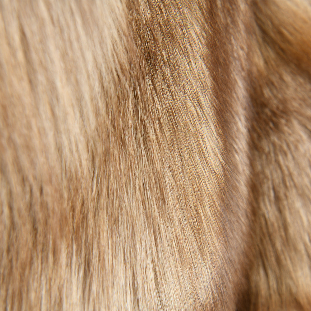 Close up from a fox fur coat for women. 