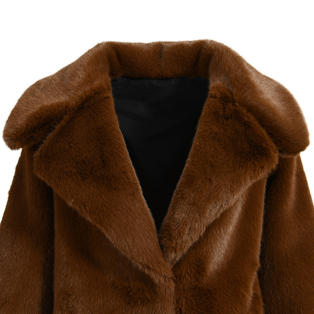 Close up of a brown faux fur coat for woman. 