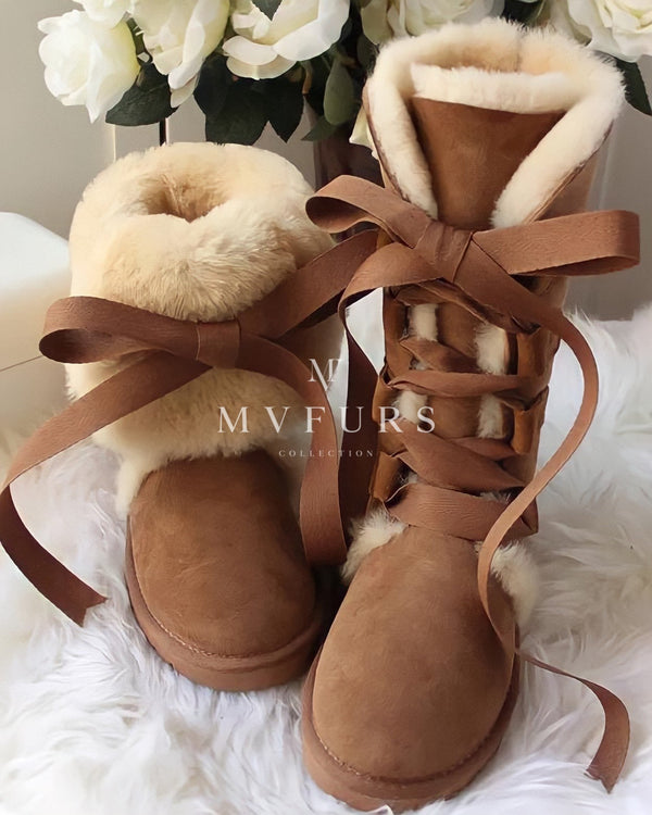 A pair of brown sheepskin leather boots designed by MVFURS