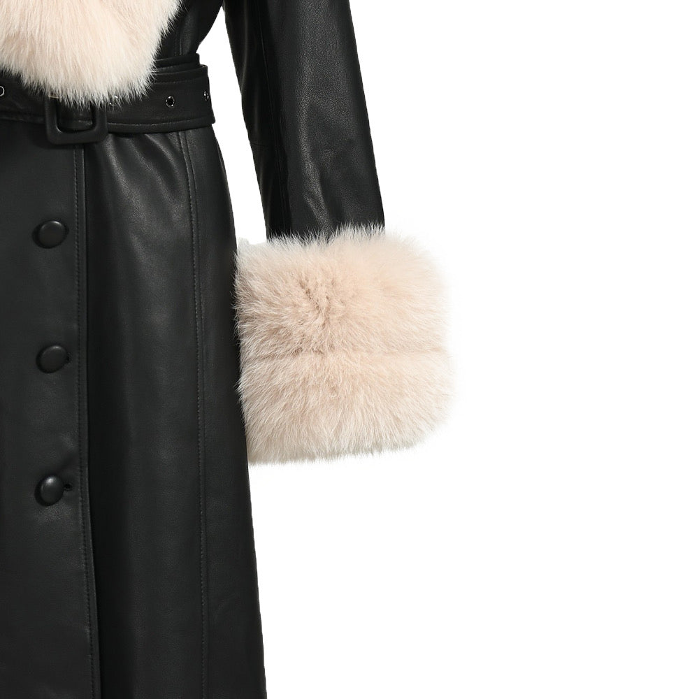 A black leather jacket with beige fur designed by MVFURS